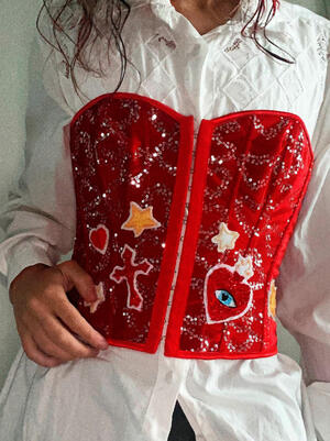 Embroidery on a ready-made corset